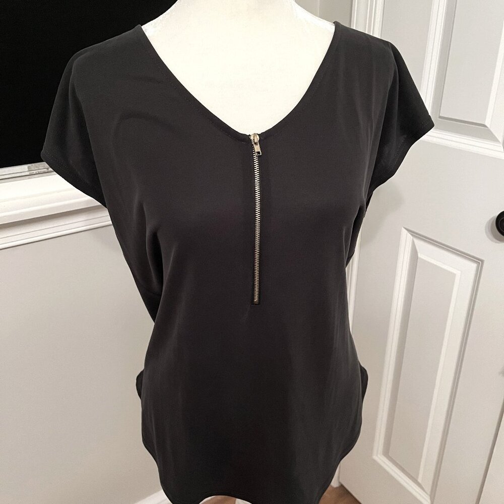 Black top with zipper neckline